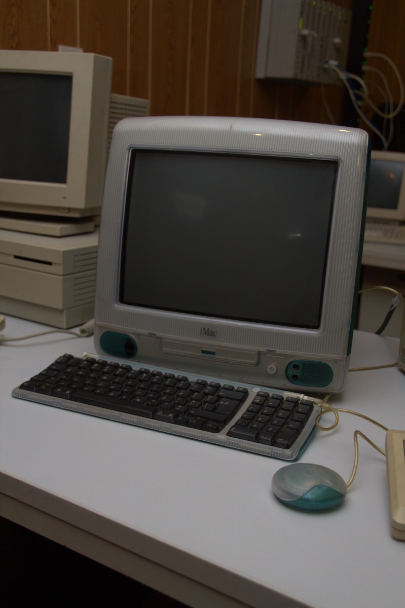 A translucent coloured Apple iMac G3 all-in-one computer with a CRT screen