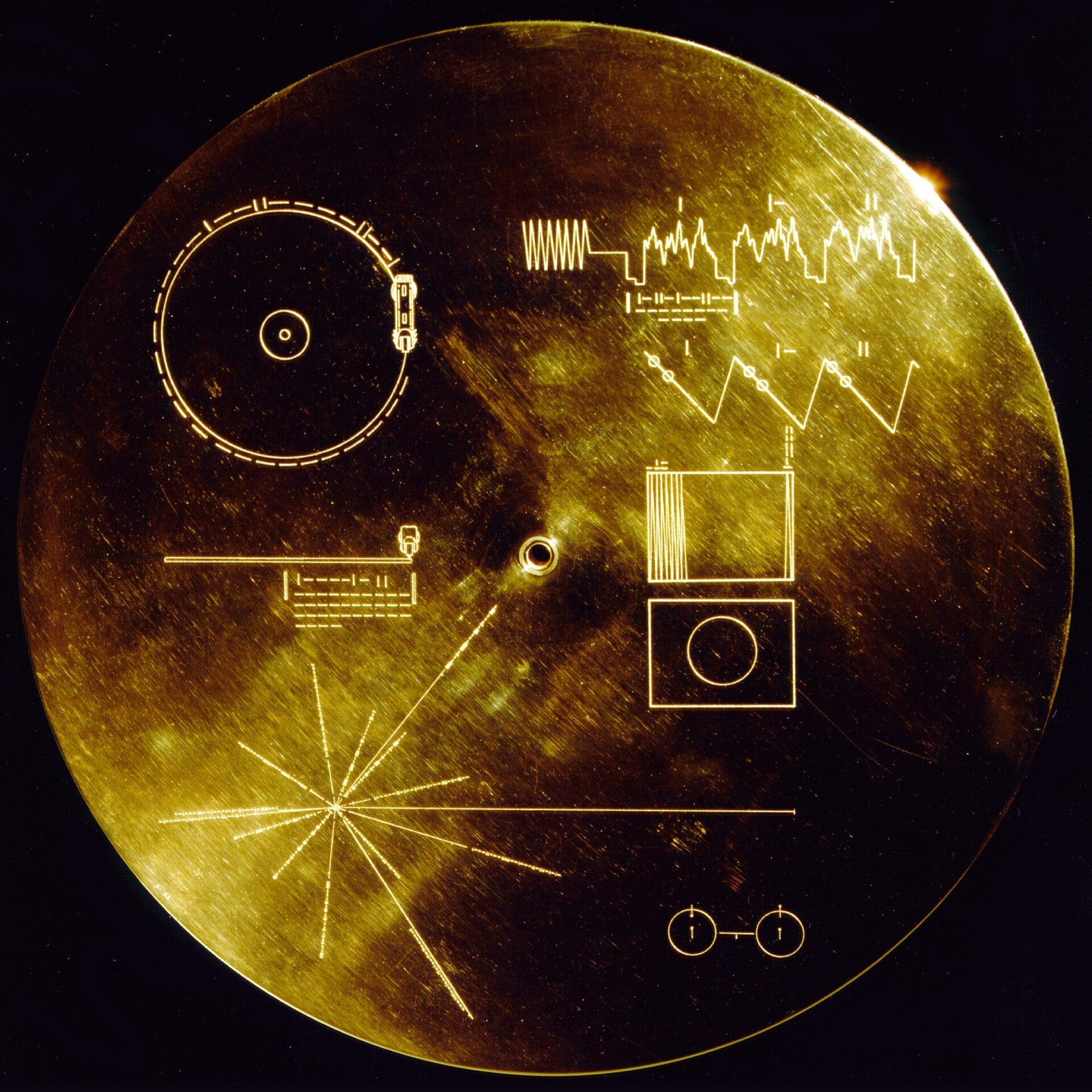 The gold-plated cover of the Voyager Golden Record, engraved with diagrams explaining how to play the record and where it came from